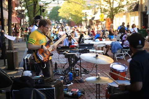 A band plays music during Thursday Night Out event in Downtown Oak Park business district