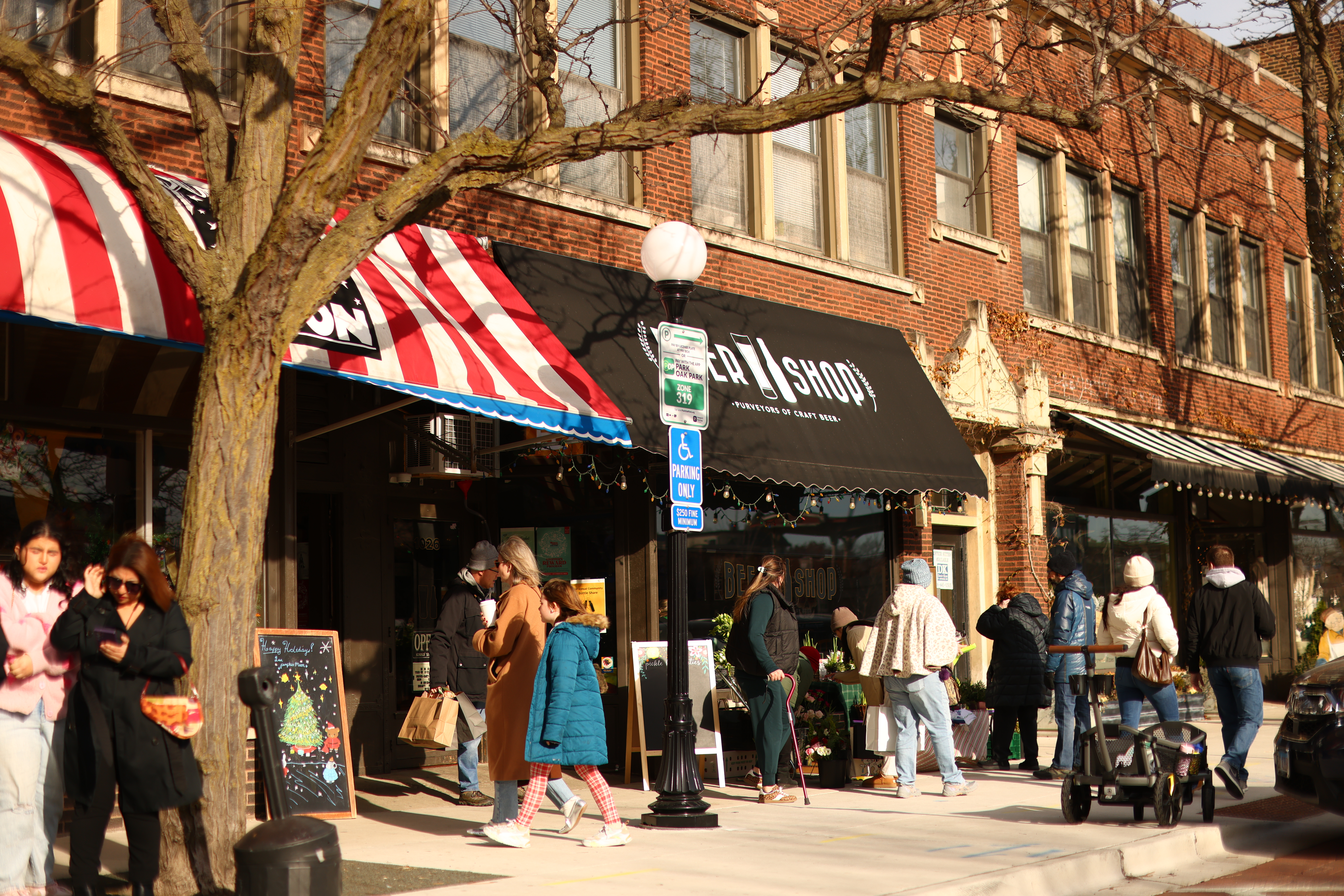 People visiting downtown Oak Park in winter