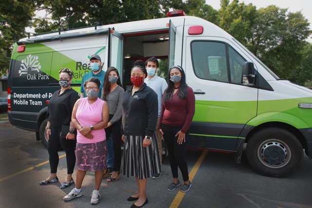 photo of Oak Park Health Department staff and the mobile response van