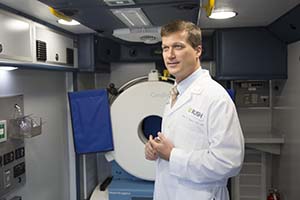Photo of Dr. James Conners inside the Mobile Stroke Unit